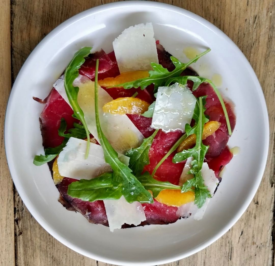 House-cured Belted Galloway bresaola, pecorino cheese, orange and rocket. Now with added black summer truffle! On at Chapel this week. 
#homemadefood