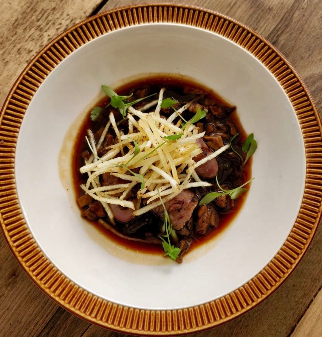 A welcome return for our miso-marinated duck hearts served in a chilli, lime and ginger-infused cep broth with matchstick potato crisps and coriander. #corkagebath #batheats #smallplates