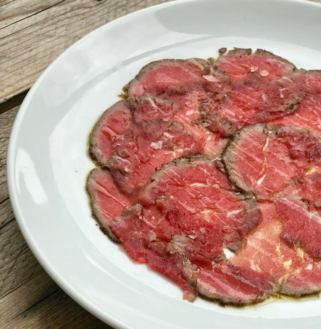 From the half cow we bought recently, this delicious peppered beef carpaccio just needs a garnish. What shall we put with it? #corkagebath #batheats