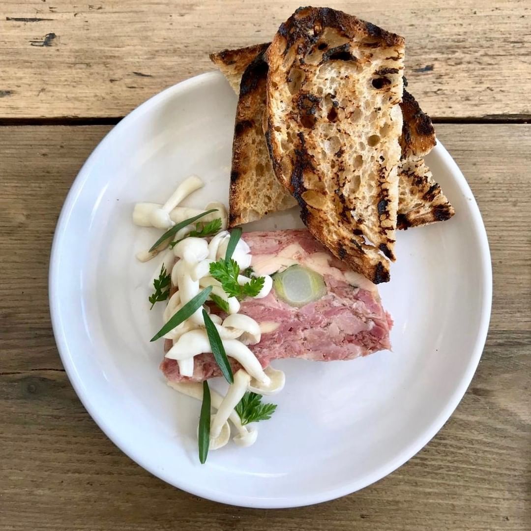 New terrine on the menu at Chapel Row – ham hock, smoked chicken and leeks, served with pickled shimeji mushrooms, tarragon and Bertinet sourdough toast. #breadmatters #corkagebath #batheats #bertinetbakery