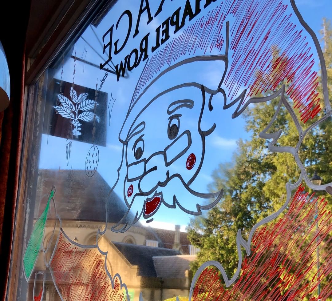 Laura our very own in-house artist (and wine slinger) has done a fine and suitably ruddy rendition of you-know-who to grace our window at Chapel Row. What will his doppelgänger at Walcot Street look like we wonder?