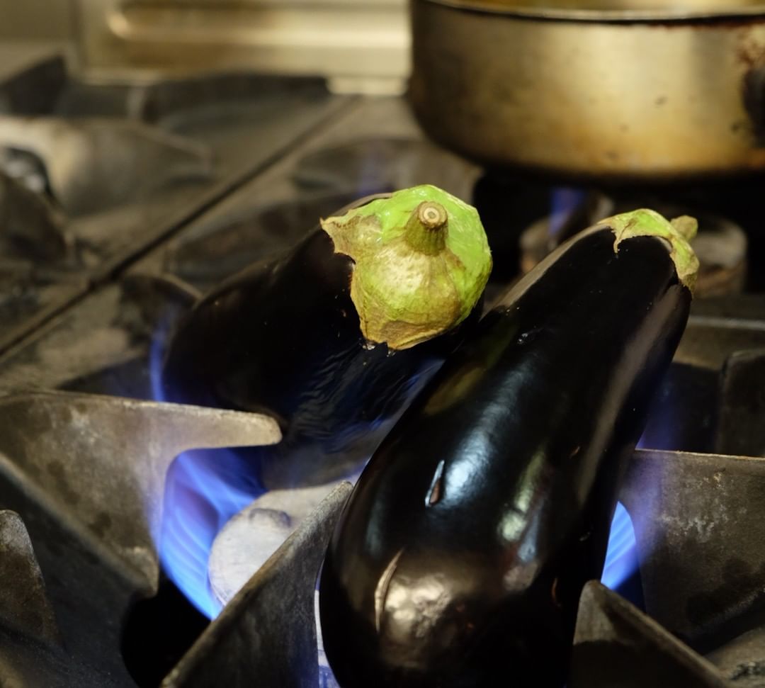 Baba ganoush. The perfect dip who’s origins are unknown. The trick is in the charring. They need to almost be collapsing in on themselves to get that wispy smoke note right through the flesh. Here’s ours in the flame. One of our light bites at Chapel Row.