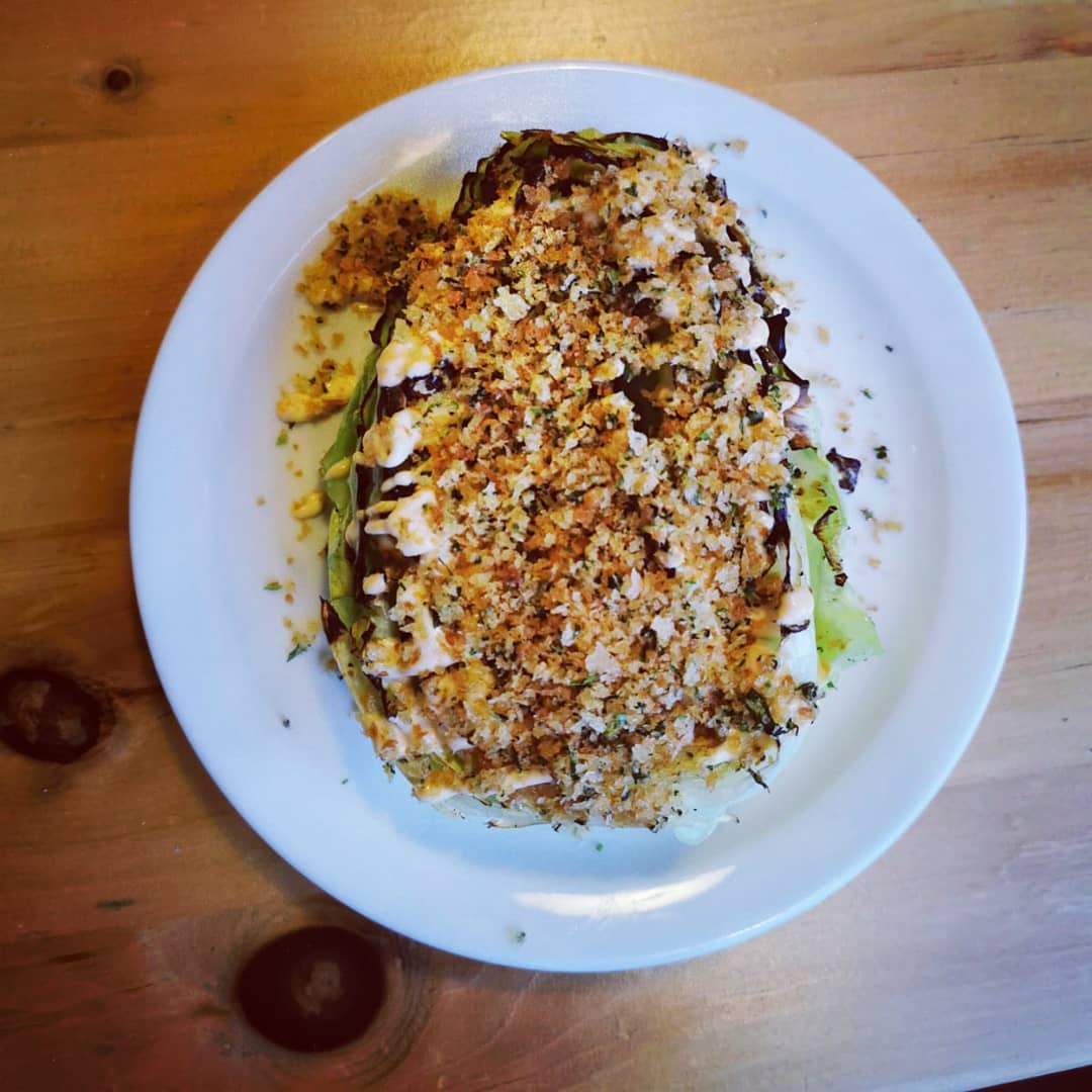 Welcome to the hispi revolution folks! 
It’s still chargrilled, it’s still with miso butter. But now it’s finished with our homemade kimchi mayo that’s been fermenting for a while and topped with parmesan, chervil and tarragon panko.
Come and get it!
@prettylittlebathuk
@bathrestaurants
@crumbsmag
@thebathmagazine
#corkagebath #restaurant #freshisbest #chefslife